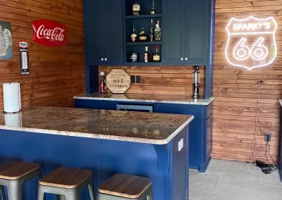 Home Bar Design from custom Route 66 neon sign and cabinets to granite and decor