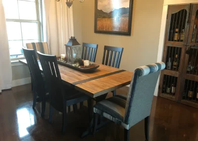 Magnolia farmhouse dining table with tuxedo chairs