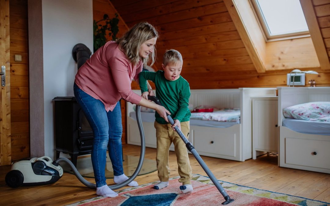 mother and son vacuuming